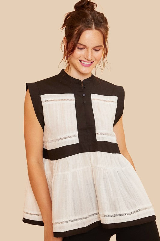 Stylish Peplum Blouse with Contrast Trim & Button Details – Perfect for Every Occasion